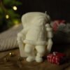 Papá Noel descansando Vela decorativa